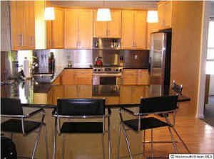 Gourmet Kitchen with 42 Inch Maple Cabinets, Granite Counters, SS Appliances