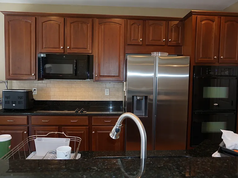 Kitchen with 42" cabinets, Double Oven, Built in Microwave, Black Granite Counters