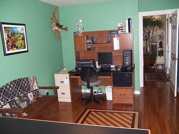 View of bar/office; hardwood design on floor