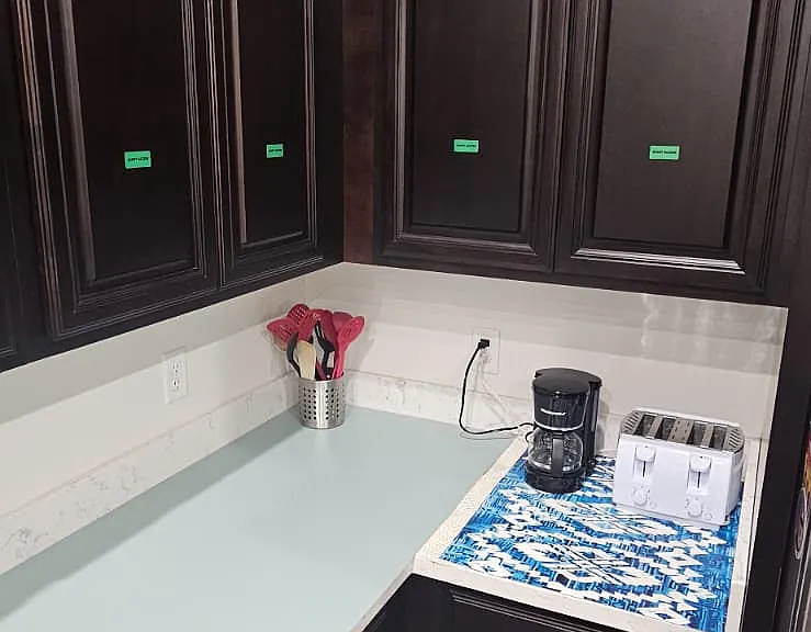 Kitchen cabinets for guests only.