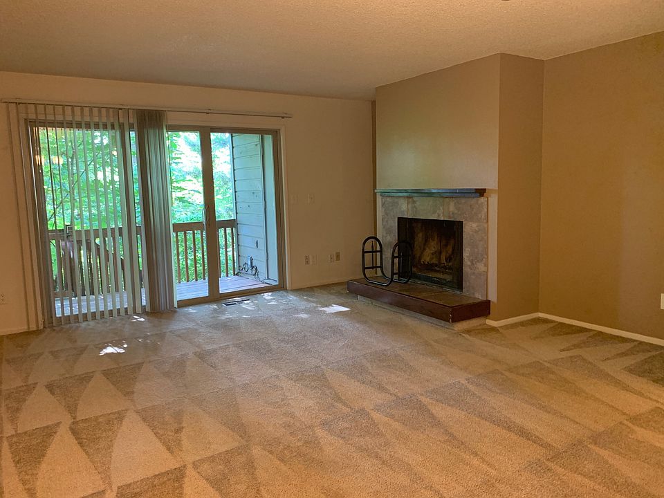 Peg Tree - Picturesque Living Area with Fireplace