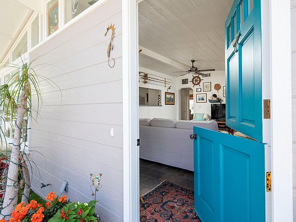 Inviting Dutch door to let in the ocean breeze!