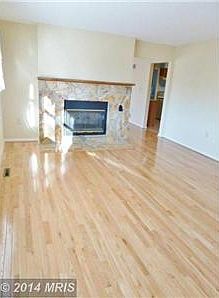 Living Room w/ Two-sided Fireplace