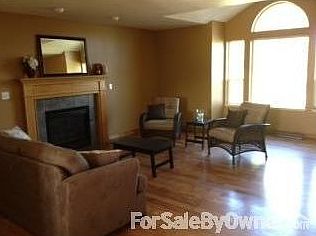 Main living room
						:
						Brand new hardwood floors, gas fireplace & paint!