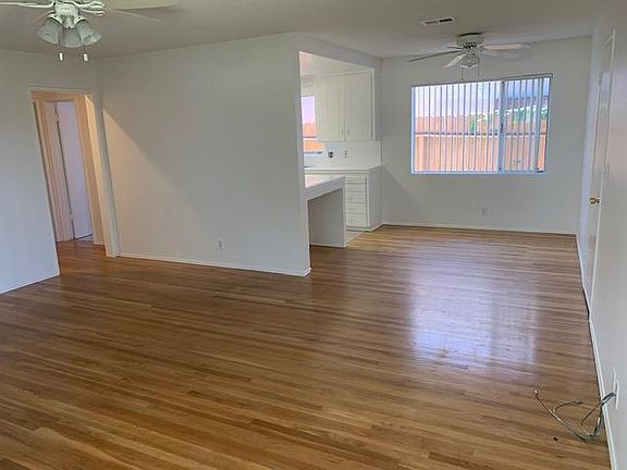 Oversized living room with gorgeous original wood floors