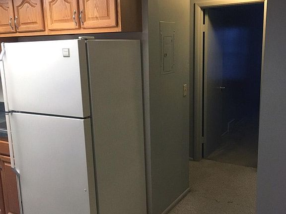 Refrigerator/Hallway/Master Bedroom Entrance