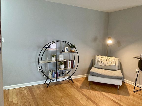 Living room facing wall.