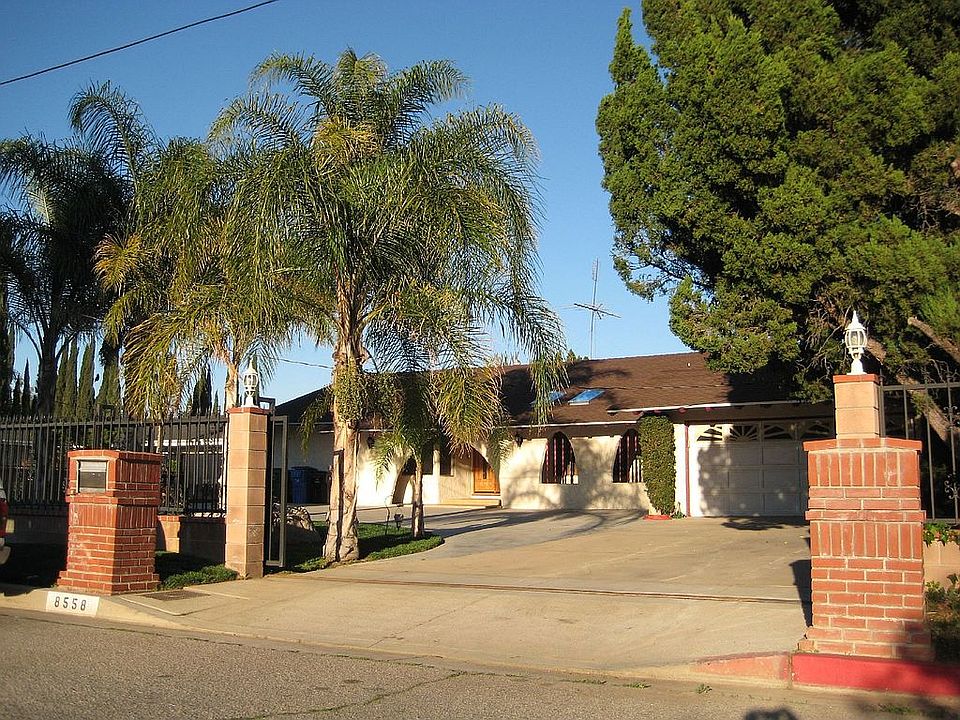 Superb Living in this Remote-Entry Gated Home