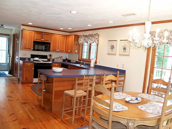 spacious kitchen that opens to a 30x22 deck overlooking private yard