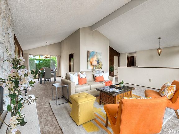 The living room opens to the dining room. Perfect for entertaining.