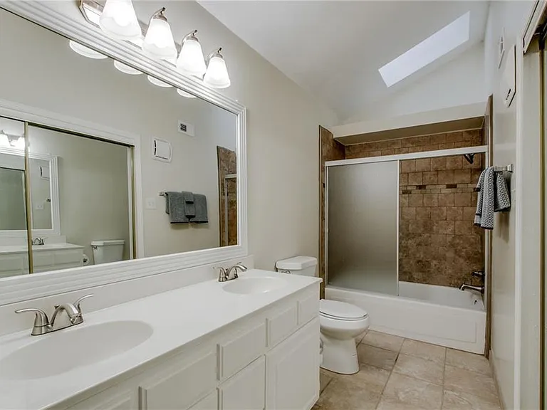 Master Bathroom # 1 with spacious closet on the right
