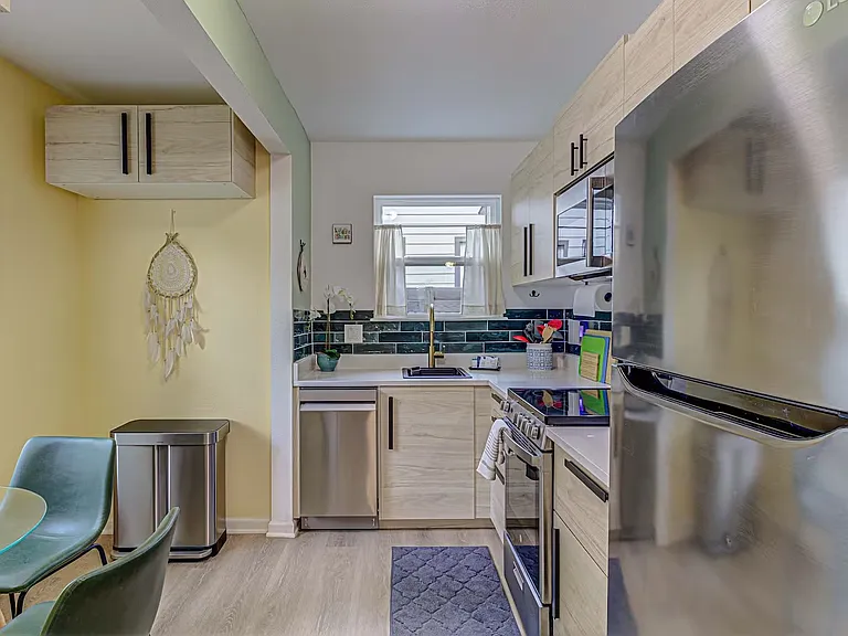 Kitchen is fully equipped; dishwasher, fridge, electric stove and microwave.