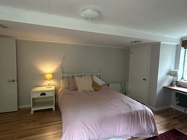 lower level bedroom, queen bed pictured.