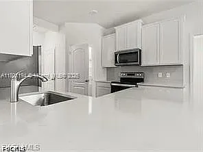 209 SE 26th Terrace Cpe — Photo 21