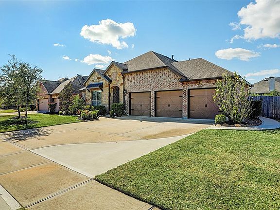 Extra wide driveway with HOA approval