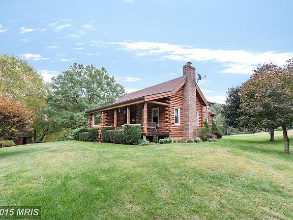 Meticulously Maintained and Updated Log Home