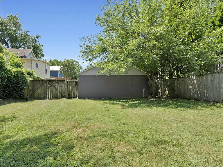 Garage is part of the property but is used for storage by the lower unit.