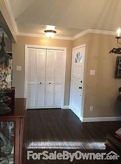 Entrance
						:
						Nice size coat closet. Tile floors with scraped hardwood look in living areas.