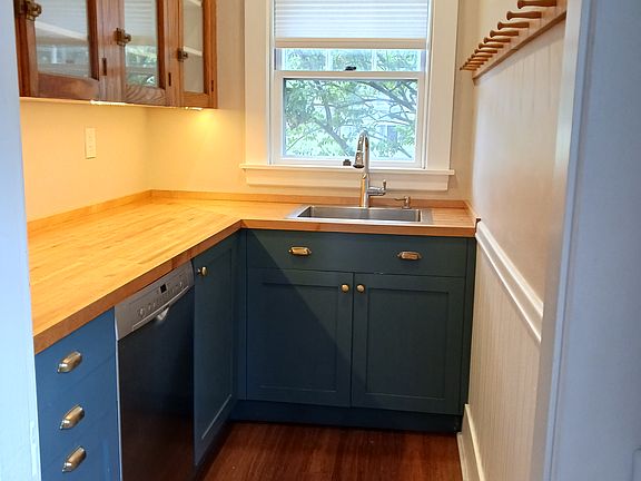 Butler's pantry with custom cabinets and lighting