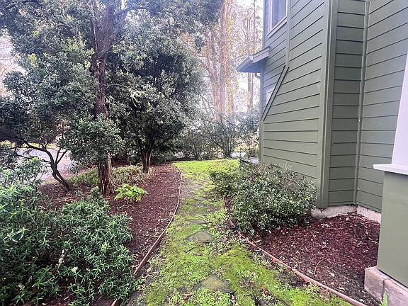 Walkway from front yard to side yard