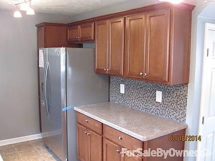 Kitchen
						:
						Glass and stone mosaic tile backsplash.