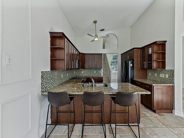 4583 NW 7th Pl — Photo 13