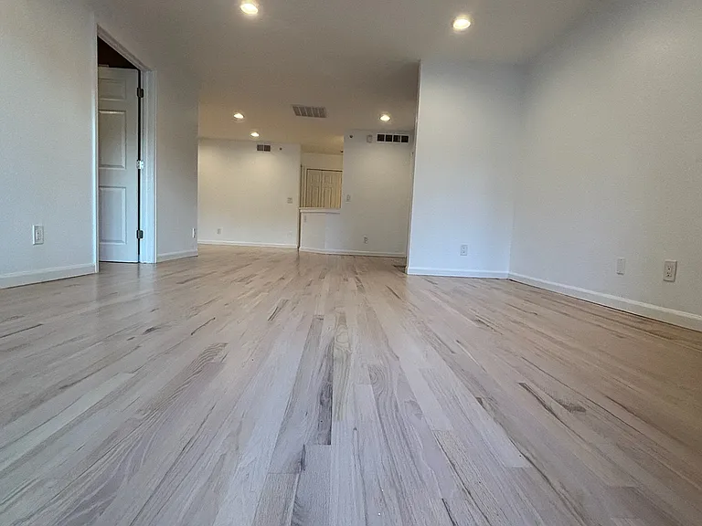 view of open living space, main bedroom (left)