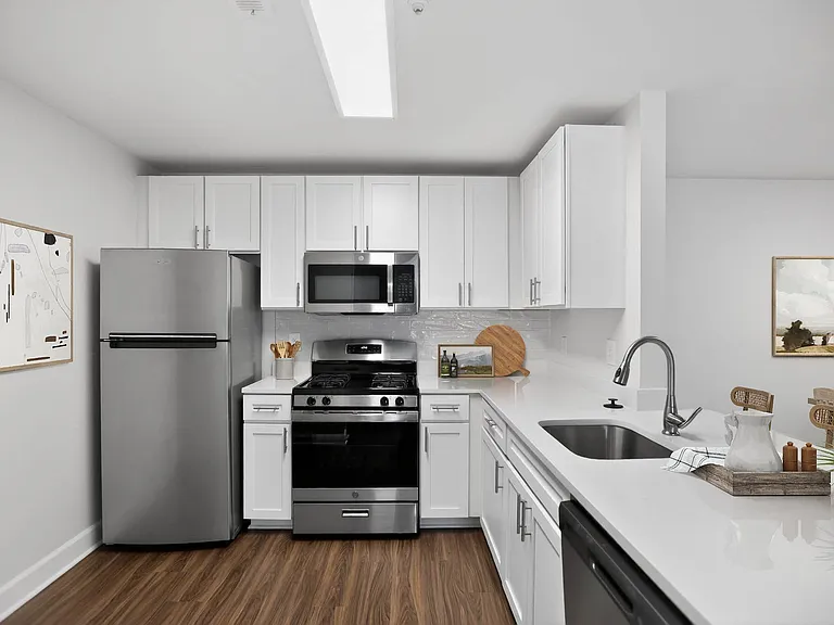 Welcome to Eagle Rock Apartments at Columbia Pike, where modern kitchens blend elegance and functionality. Enjoy premium appliances and an inviting atmosphere designed for your comfort. Schedule a visit today to find your perfect home!