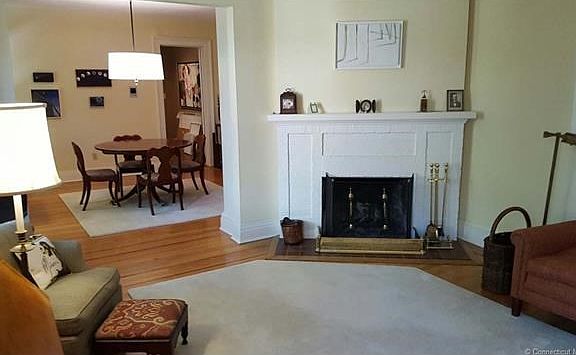 Living room with working fireplace.