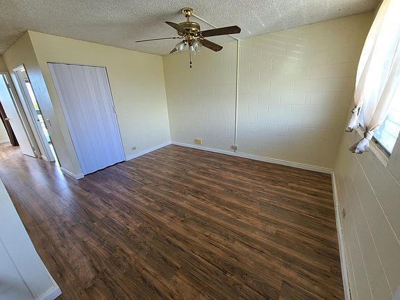 Main living room area with coat closet. Cable-ready.