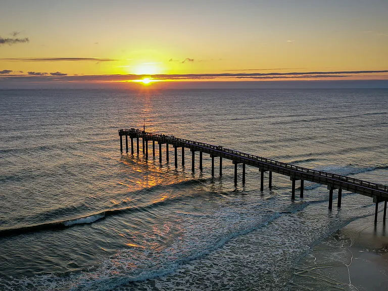 Just minutes from your front door! Spend your days exploring the soft sands, searching for seashells, and walking along the beautiful local pier.