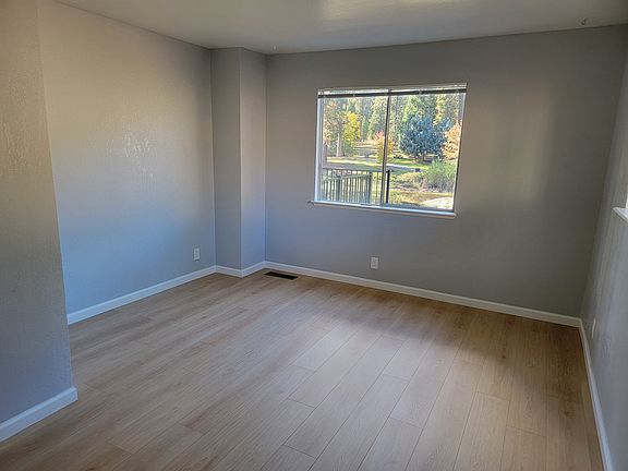 Downstairs Master bedroom. Start every morning off right with a parkside view right out your window.