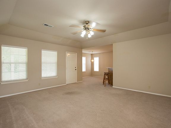 Living room is open to dining area