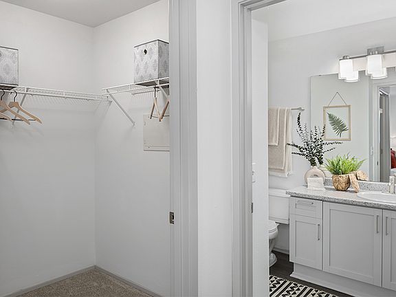 Main bathroom with upgraded lighting and countertops