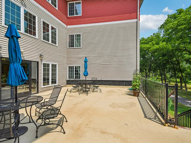 Unwind on your private patio at Mill Pond Apartments, perfect for outdoor lounging and entertaining in a tranquil setting. Enjoy the lush views and ample space for relaxation. Don't miss your chance to call this serene community home!
