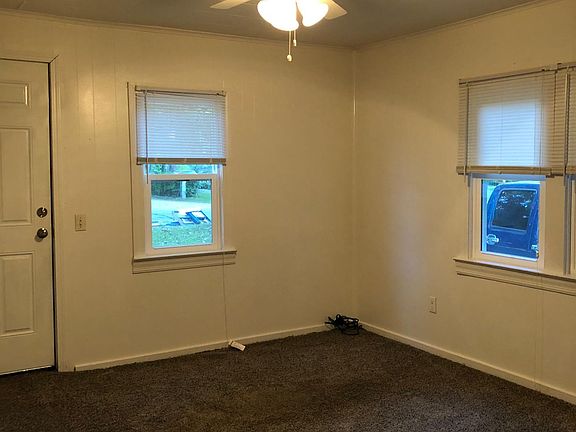Large living room with new carpet