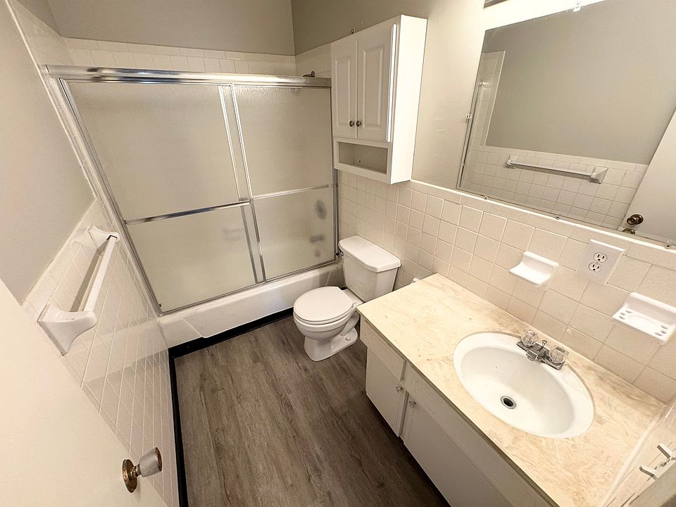Bathroom with tub and shower combo