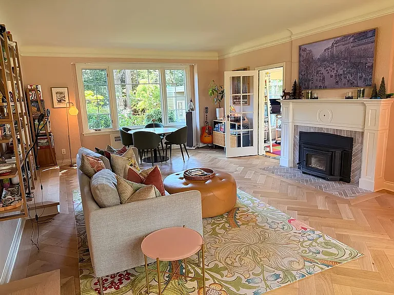 Main living room with wood fireplace