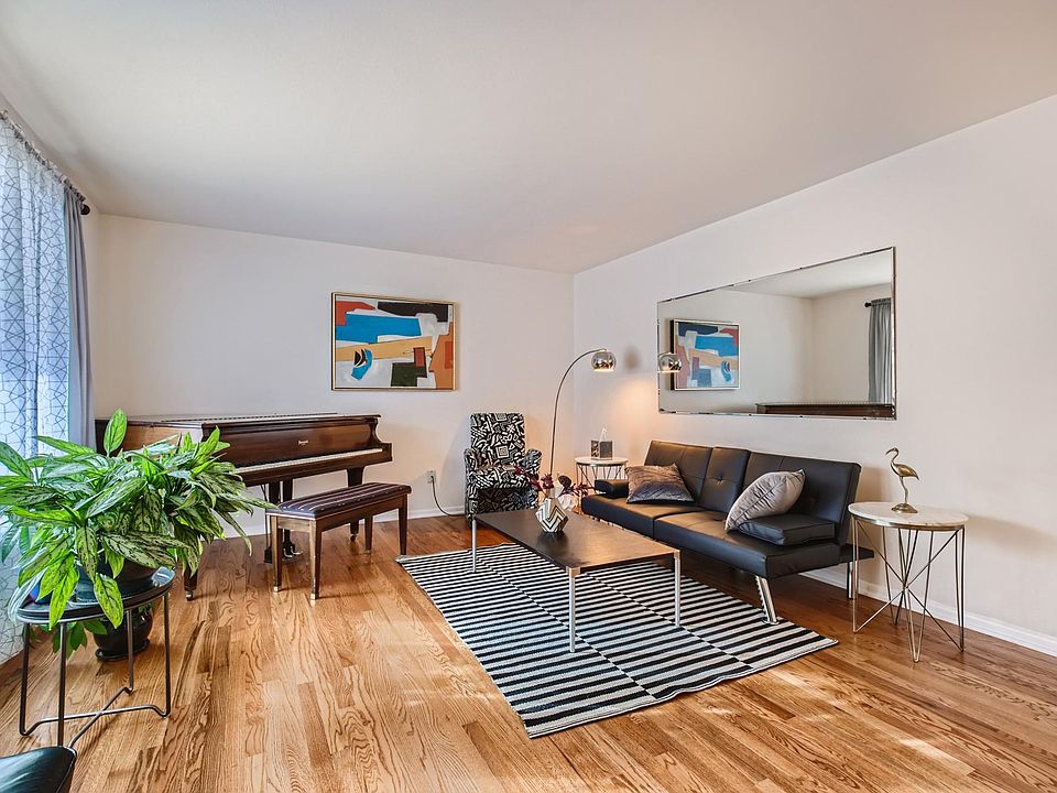 As you walk in, you're greeted by a beautiful room with a baby grand piano. No screen zone is perfect for relaxing, reading, or piano practice!
