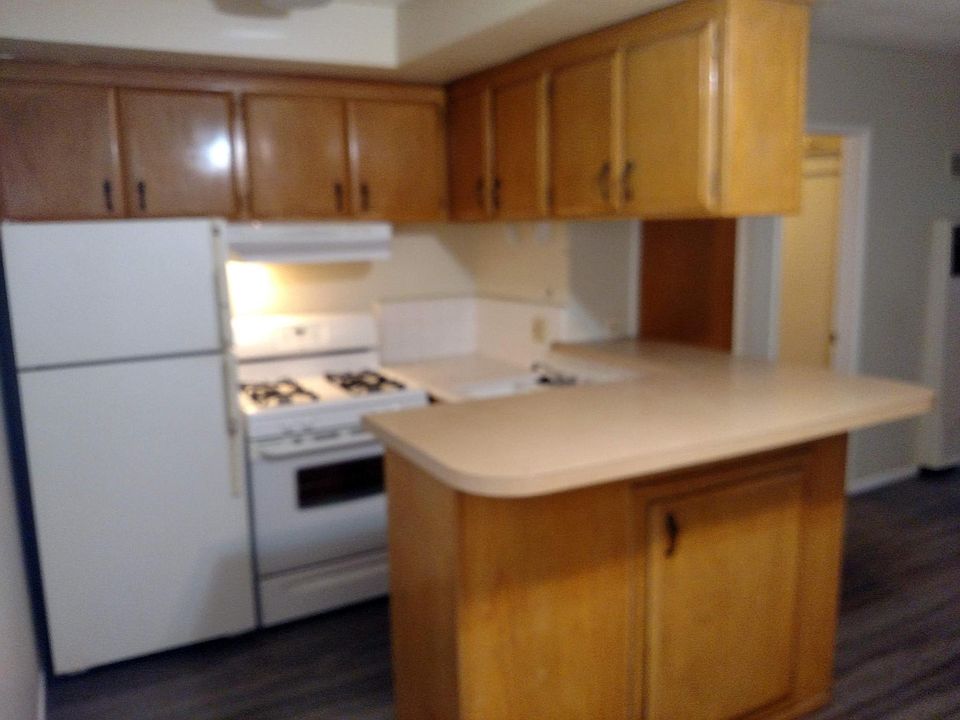View of Kitchen, Full Size Refrigerator & 30" full size stove/oven