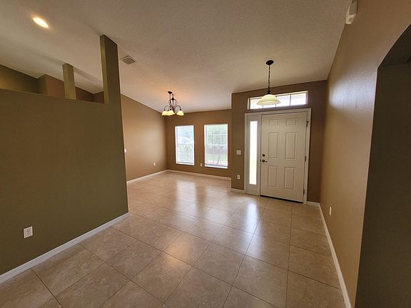 Front door and dining room