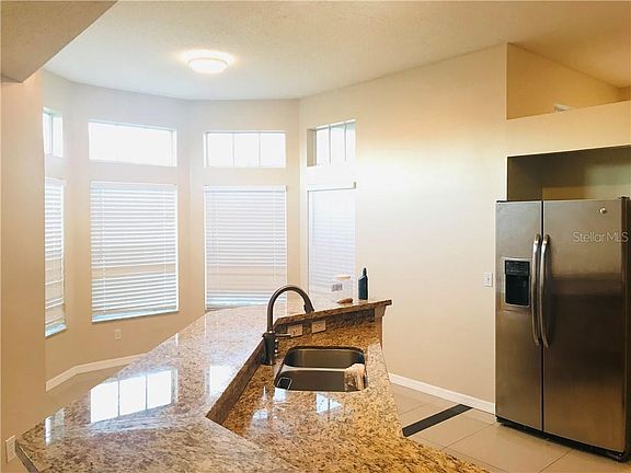 4th image of 14936 Wild Wood Lily Ct
