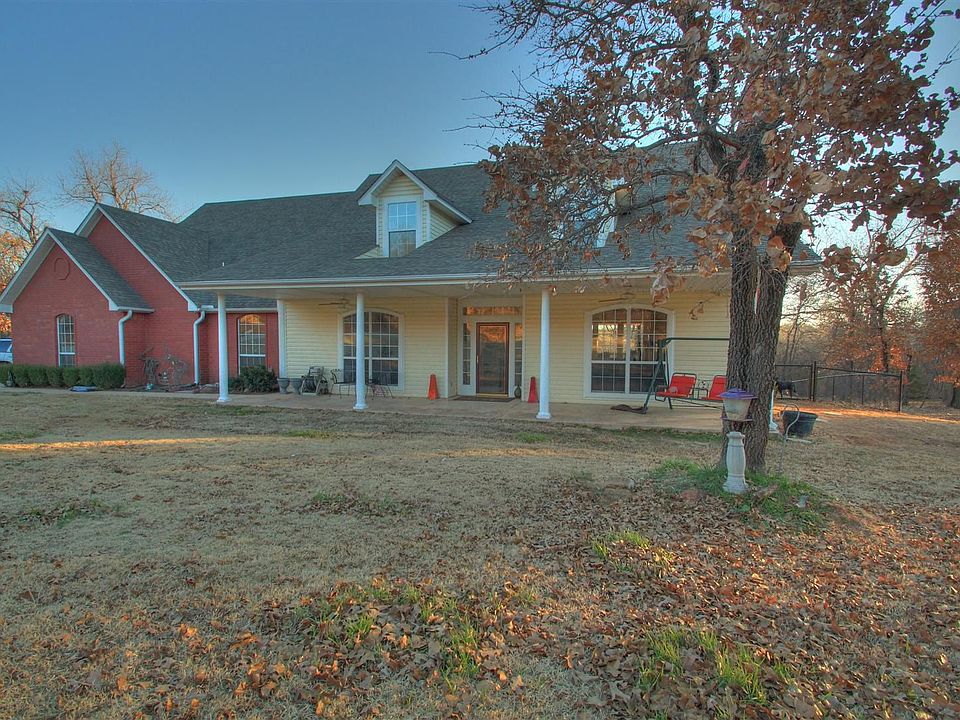 notice the ceiling fans on porch
