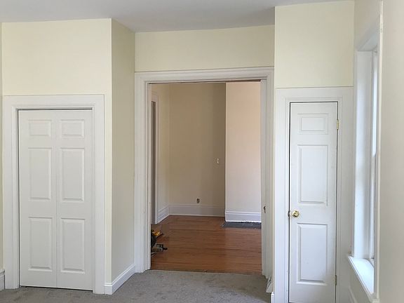 King size bedroom facing the dining room.