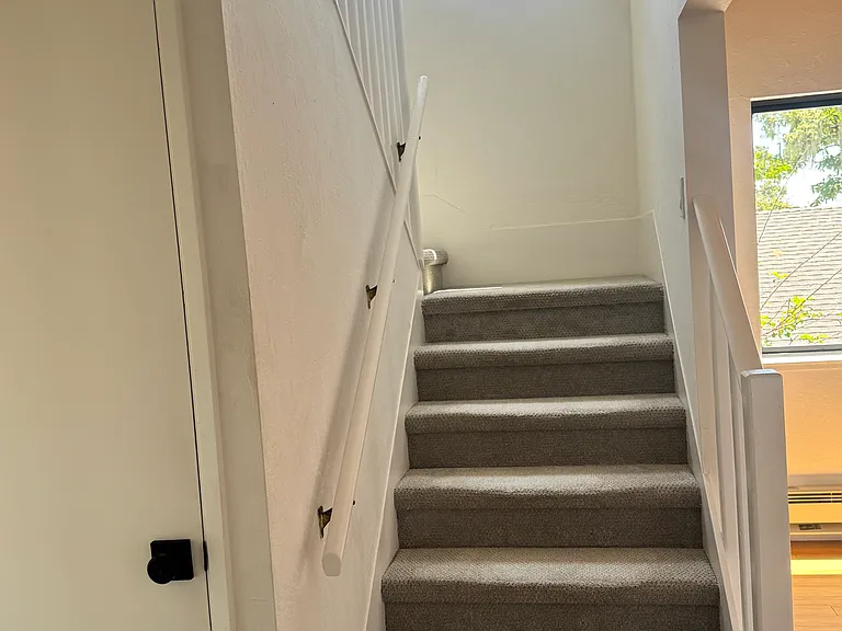 Stairs to the master bedroom.