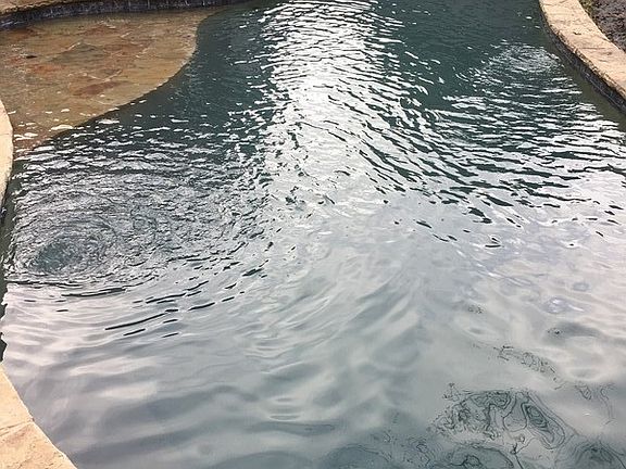 Pool
						:
						Custom lagoon-like gunite pool. Tanning ledge, jump rock, fountain/bubbler.