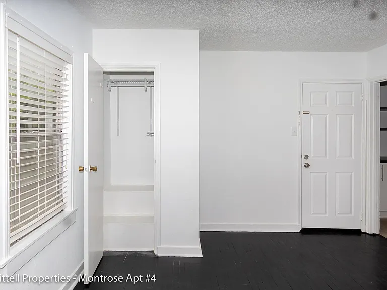 Living room storage comes comes with Rubbermaid additions