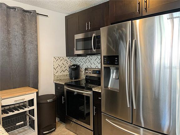 4th image of 12277 Armenia Gables Cir #12
