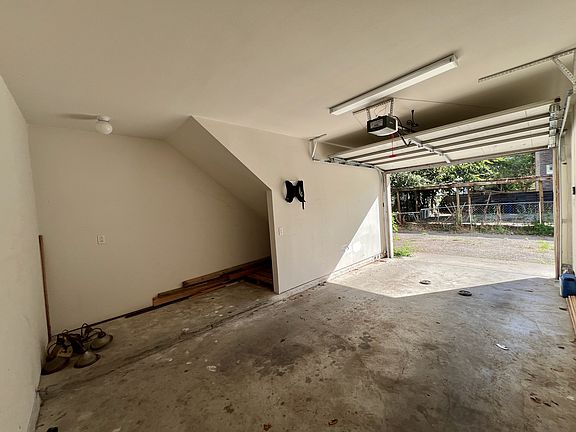 6015 Ross Avenue 1 car new garage with a window & storage!