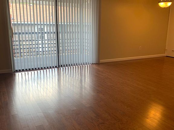 sliding glass doors to balconies 
Beautiful hardwood flooring